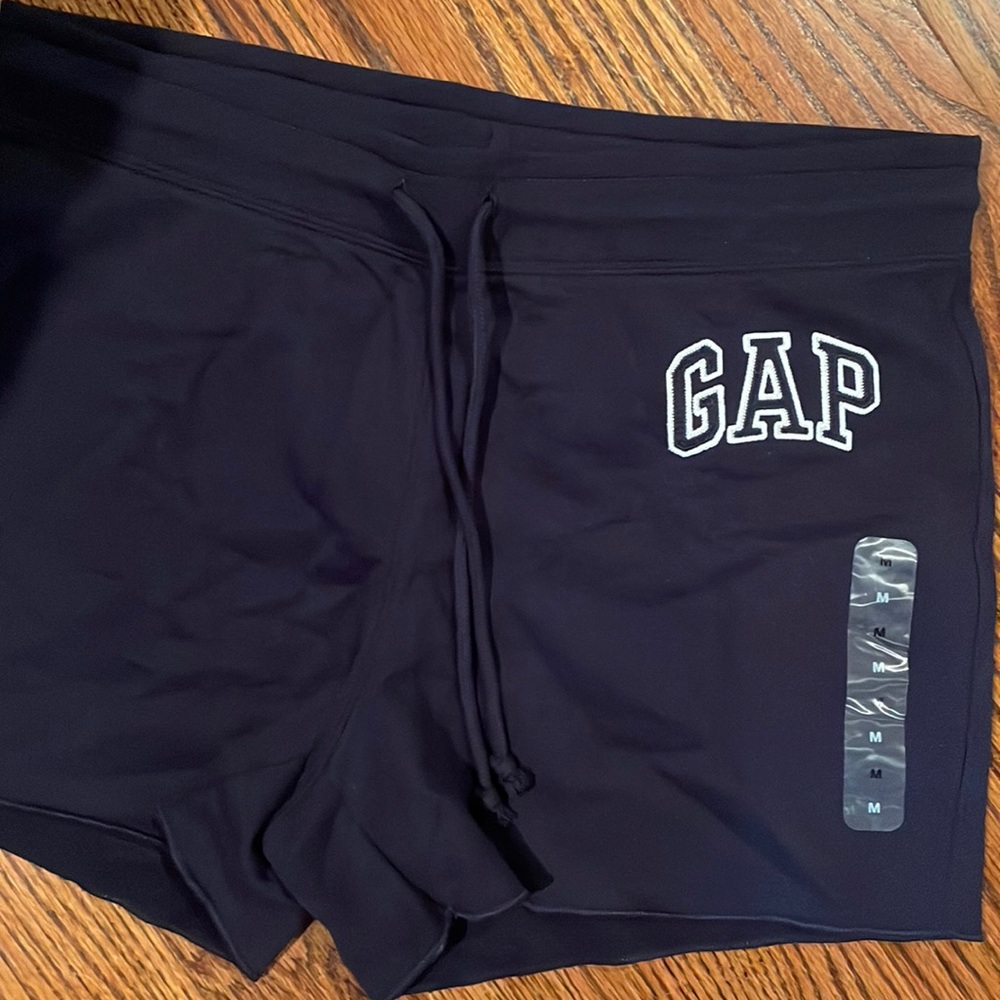 Never worn. Tags on. Gap size M navy blue shorts